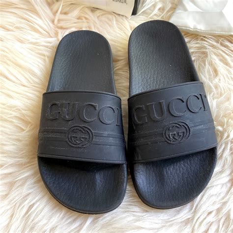 women gucci rubber slides|Gucci rubber pursuit g slides.